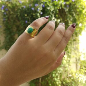 Adjustable green stone ring