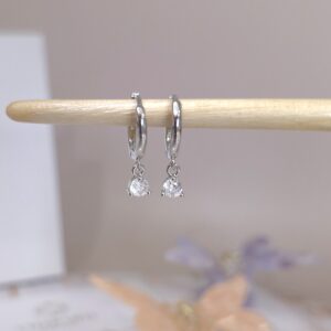 Single diamond earrings